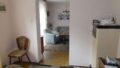 Blick von Esszimmer ins Wohnzimmer