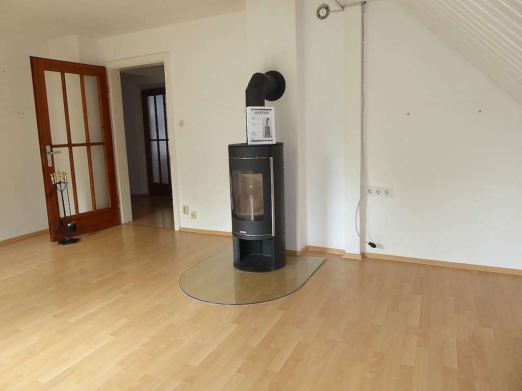 Wohnzimmer DG mit Holzofen